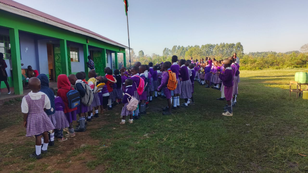 Children enjoying lunch at Gracie's Academy in Kuria, Kenya